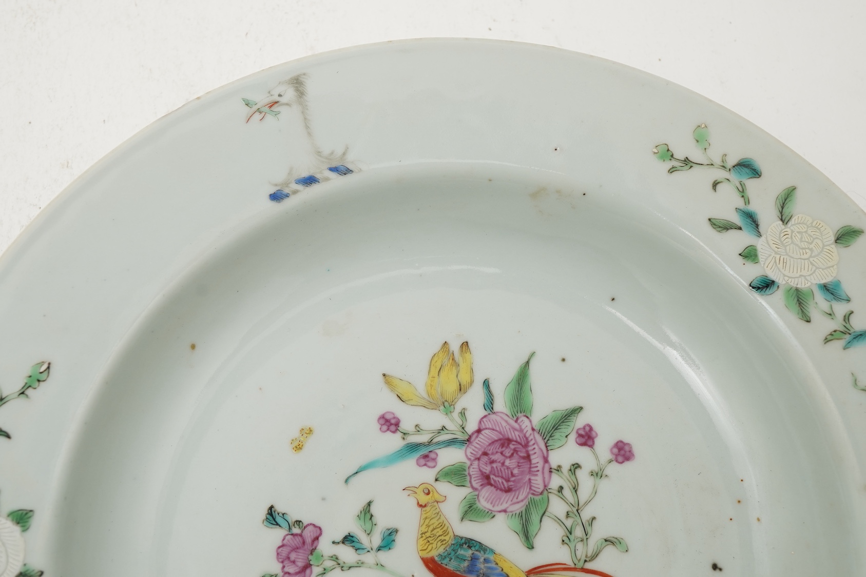 A pair of Chinese famille armorial plates, Qianlong, c.1750